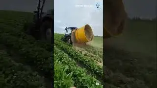 The process of bale shredder with tractor Woking in the field