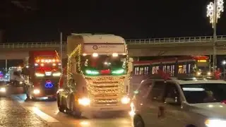 GDANSK | 2025 | A FESTIVE CONVOY OF TRUCKS WITH TRAILERS ILLUMINATED WITH COLORFUL LIGHTS | POLAND 