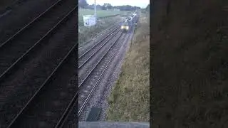 68 034 leading on Sellafield to Crewe nuclear flasks at Badger Bridge in the twilight