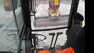 Grading out new car parking bays with the Engcon and grading beam