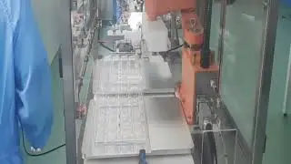 Reagent boxes press capping sticker labeling trays inserting line