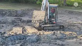 This pond muck was so deep ! #mud mats # excavator