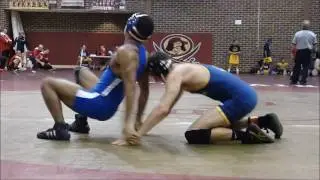 CUW freshman wrestler Greg Sanders back flip