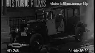 1930S AUTOMOBILE EXPLODES ON CITY STREET, CAR BOMB