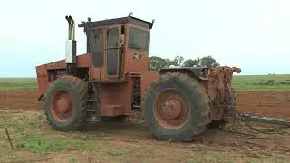 ACO 250 with V8 biturbo and straight pipes pulling disc harrow in South Africa