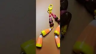Sugar➖️coded🤎➖️ Candy corns, red hots & chocolate heart beads Key charm. On a swivel snap💥clasp.