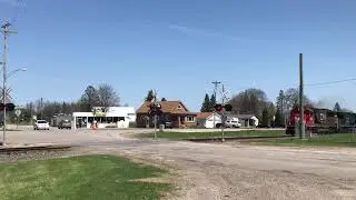 CN SD60 passing through Bark River with a Leased ex-CSX unit
