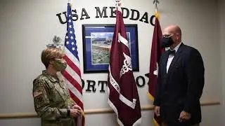 Dr. James Stephens, Ft. Knox Public Health, receives a coin for COVID-19 operations contact tracing