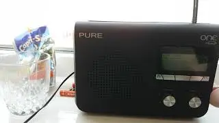 The PURE ONE Flow Portable Internet , DAB+ FM Radio playing talk radio