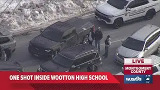 One person is in custody after someone was shot inside Wootton High School