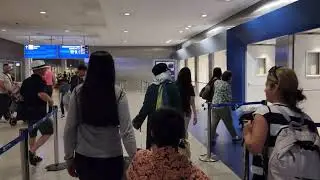 Walking to Immigration at Athens International Airport.
