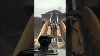 Cat 980h loader loading coal 