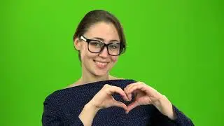 Teacher Shows a Figure in the Shape of the Heart  Green Screen Video  | No Copyright Stock Video