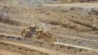 Bulk dozer push with 4 D11 dozers,
