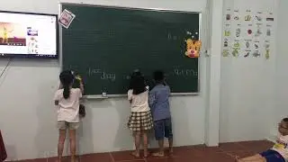 Kids 1A- listen, write then touch the correct picture