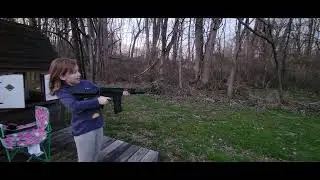 Teagan shooting toy gun