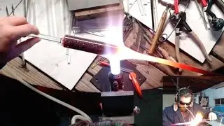 Heat Gradient Dictates Shape (Drawing molten glass tubing into a smaller diameter)