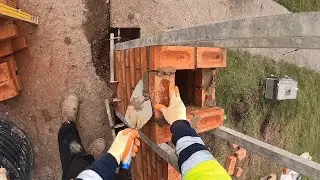 Bricklaying: pier profile set up and building with head cam