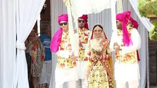 Gaylord Palms Indian Wedding by Riant Films - Bride's walking down the aisle - Poorita + Kishan