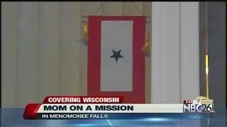 A military mother receives a donation to help her son