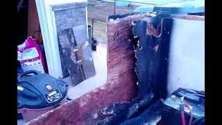 Sea cast repair #1. After hogging out the transom core with chainsaw.