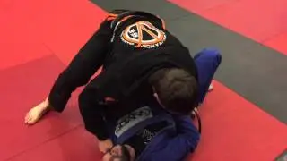 Professor Alex rolling with Coach Al at Vamos Mixed Martial Arts