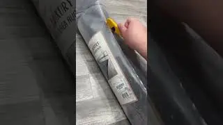 Unwrapping Plush Rug From Burlington