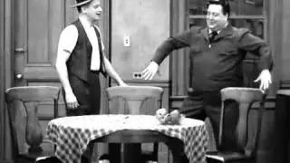 Ralph Kramden shows his best dancing moves with We speak no Americano