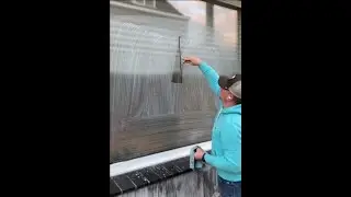 Guy Draws A Neat Mercedes Logo On A Glass Window Using Soap And A Squilgee