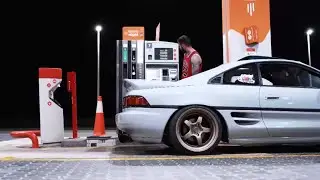 Static toyota MR2 SW20 at gas station