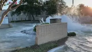 The aftermath of a massive water main break that flooded a Fort Worth street