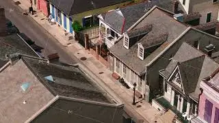 A secondary street of French Quarter, showcasing historic architecture of New Orleans with colorful