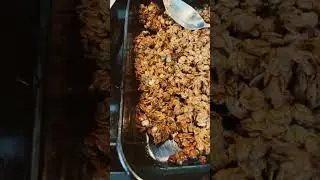 That finished peanut butter granola! Stir and rotate pans for even browning.