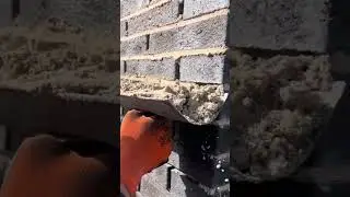 the process of filling the gaps between wall bricks using simple tools #construction #popular #wall