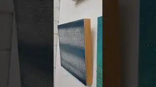 Painting the edge of a cradled wood encaustic panel