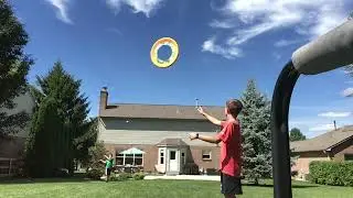 Baseball hit through hoop