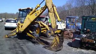 1986 John Deere 710B 4WD Loader Backhoe
