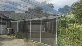Carport model spire med sidebekl&aelig;dning  monteret i Spentrup, ved Randers