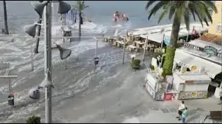 Tsunami hits Spanish resort on Menorca leaving buildings and roads flooded