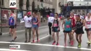 Boston Marathon Bombing survivor Carlos Arredondo, who was captured in a photo pushing a man in a wh