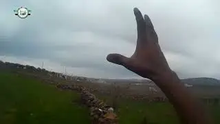 Opposition fighters document their assault on the Syrian Army controlled village of Qawqin