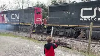 8 axle railcar leaving with a very oversized transformer on it