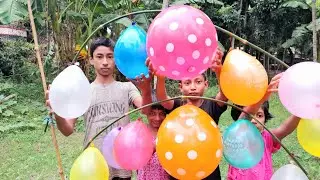 The children make a bamboo ring frpn balloons and burst the balloons one by one by color,Part-35.