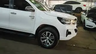 LEIL&Otilde;ES ALBINO &ndash; I/TOYOTA HILUX CDSRVA2GF 18/19 BRANCA GASO/ ALC. Financiamos ligue (17) 3211-8650.