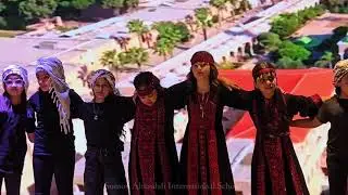 Multicultural Day - طالبات الصف الثالث في عرض عن فلسطين