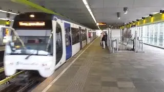 RET Metro 2*Type RSG3 buiten dienst over linkerspoor door station Zuidplein naar Waalhaven
