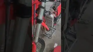 23 Beta 390rr P Tech radiator guards, IMS 3.5 gallon tank and cooling fan install