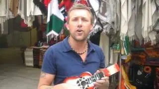 Gary plays guitar in Mexico City market