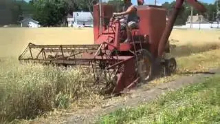 genoa, nebraska 2013,  combining oats field to use john deere binder