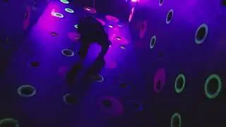 Whoa! In the dark! Owen rock climbing inside a tower with black lights! Awesome! So fun!